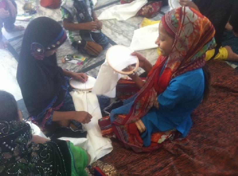 Women learning embroidery